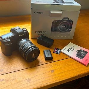 EOS 5D II SLR camera: 32 GB memory card, battery charger 28-135mm lens included